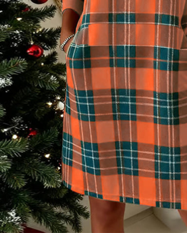 Sukienka bluzowa w kratę z długim rękawem